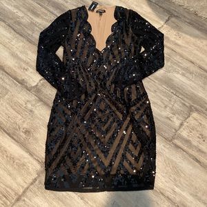 Brand new dress, tags are still on and it is from express